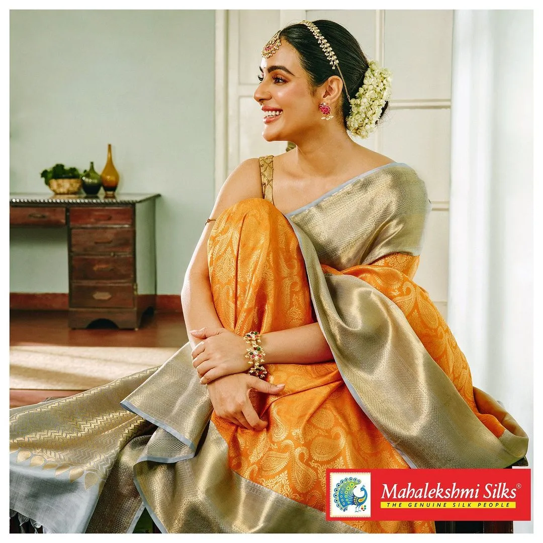 malayalam actress samyuktha menon stills in orange saree